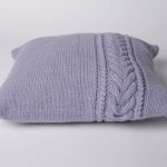 photo de conception d'oreiller tricoté